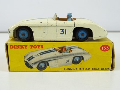Lot 126 - A group of DINKY racing cars comprising 2 x...