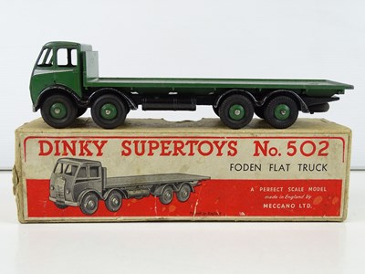 Lot 138 - A DINKY 502 Foden Flat Truck, 1st style cab in...