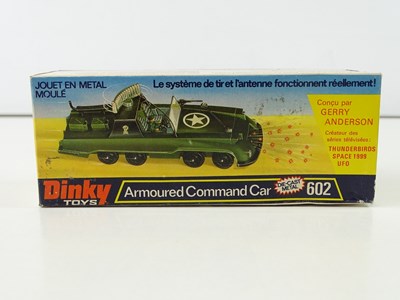 Lot 201 - A DINKY 602 Armoured Command Car in green,...