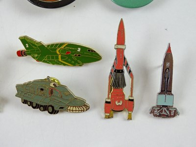 Lot 212 - A group of badges, pin badges and plastic...