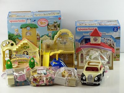 Lot 242 - A group of SYLVANIAN FAMILIES buildings and...