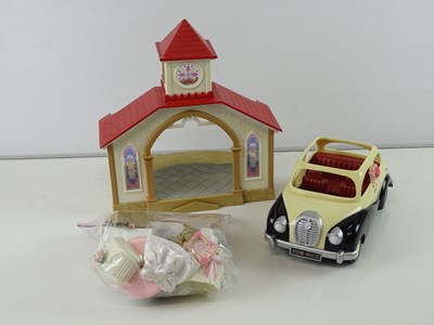 Lot 242 - A group of SYLVANIAN FAMILIES buildings and...