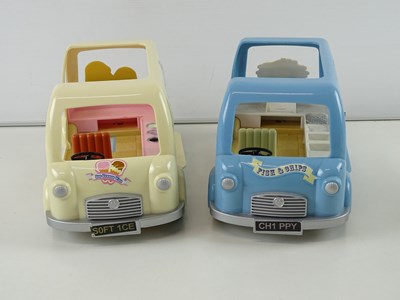 Lot 244 - A group of SYLVANIAN FAMILIES bus, vans,...