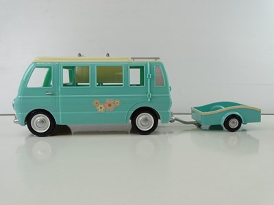 Lot 244 - A group of SYLVANIAN FAMILIES bus, vans,...