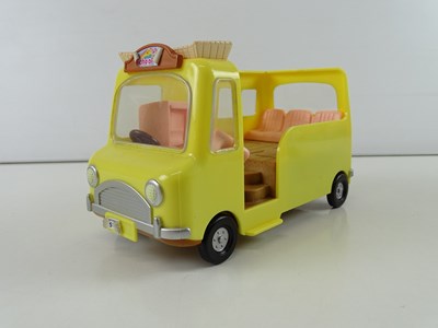 Lot 244 - A group of SYLVANIAN FAMILIES bus, vans,...