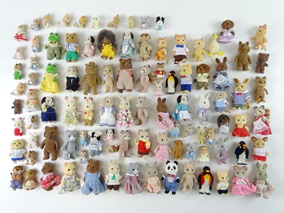 Lot 245 - A large group of SYLVANIAN FAMILIES figures,...