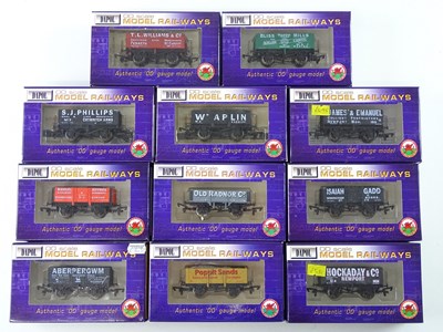 Lot 306 - A mixed group of DAPOL OO Gauge wagons...