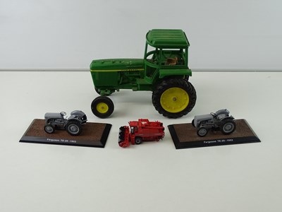 Lot 41 - A group of mixed scale diecast tractors - G...