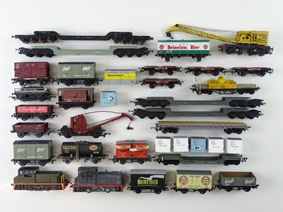 Lot 432 - A group of OO Gauge rolling stock by HORNBY,...