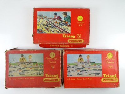 Lot 507 - A group of three TRI-ANG OO Gauge train sets,...