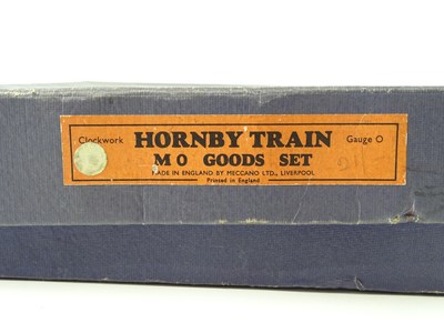 Lot 516 - A HORNBY O Gauge train set box containing four...