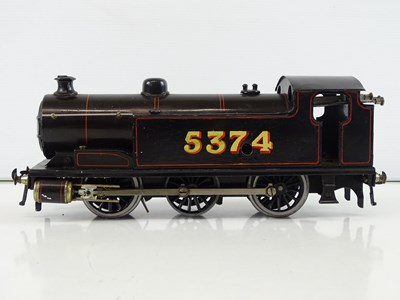 Lot 534 - A BASSETT LOWKE O Gauge clockwork 0-6-0 steam...