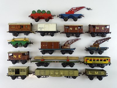 Lot 547 - A group of HORNBY and BING O Gauge wagons and...