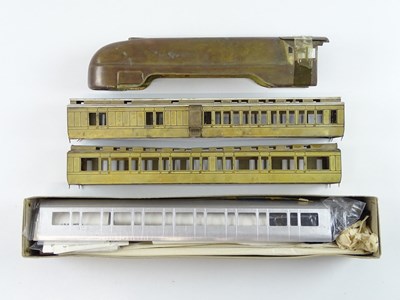 Lot 560 - A group of part built O Gauge brass coach kits...