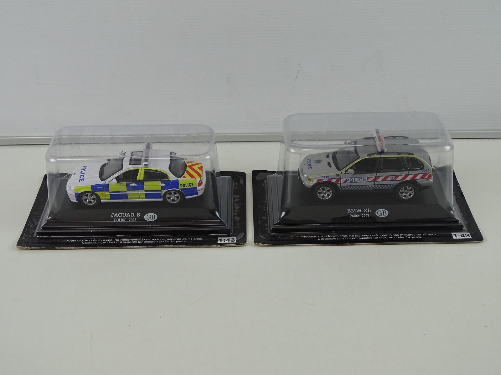 Lot 7 - A quantity of 1:43 scale police vehicles by