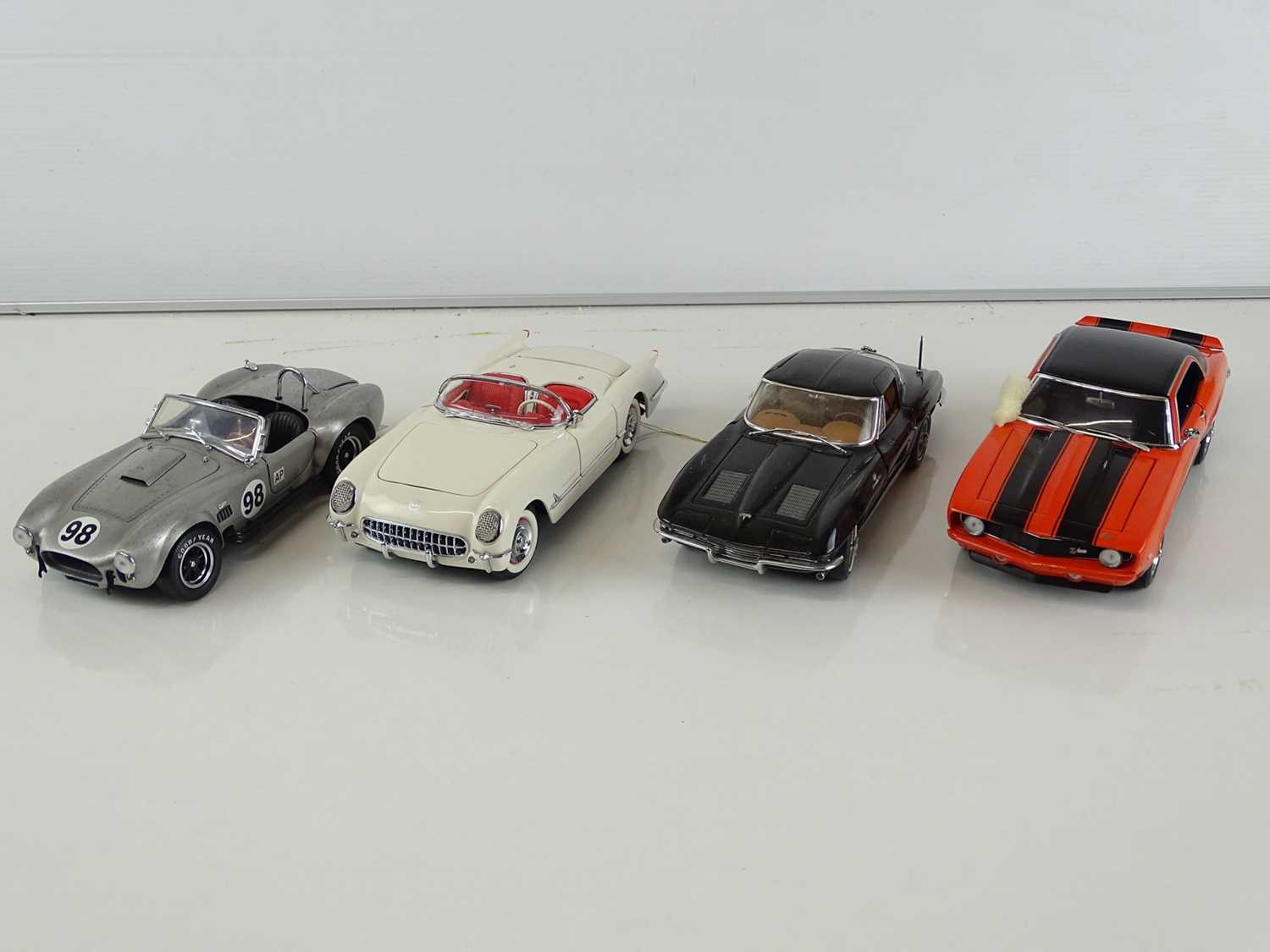 Lot 46 - A group of diecast cars in 1:24 Scale by...