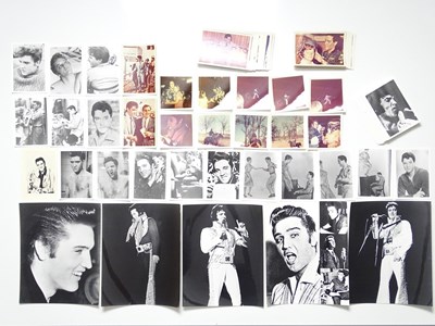 Lot 279 - ELVIS - a collection of photos of Elvis in...