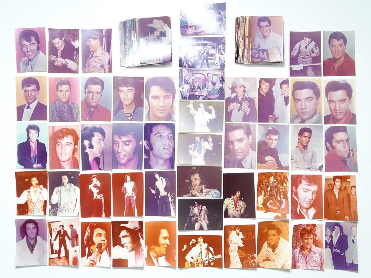 Lot 280 - ELVIS - a collection of photos of Elvis in...