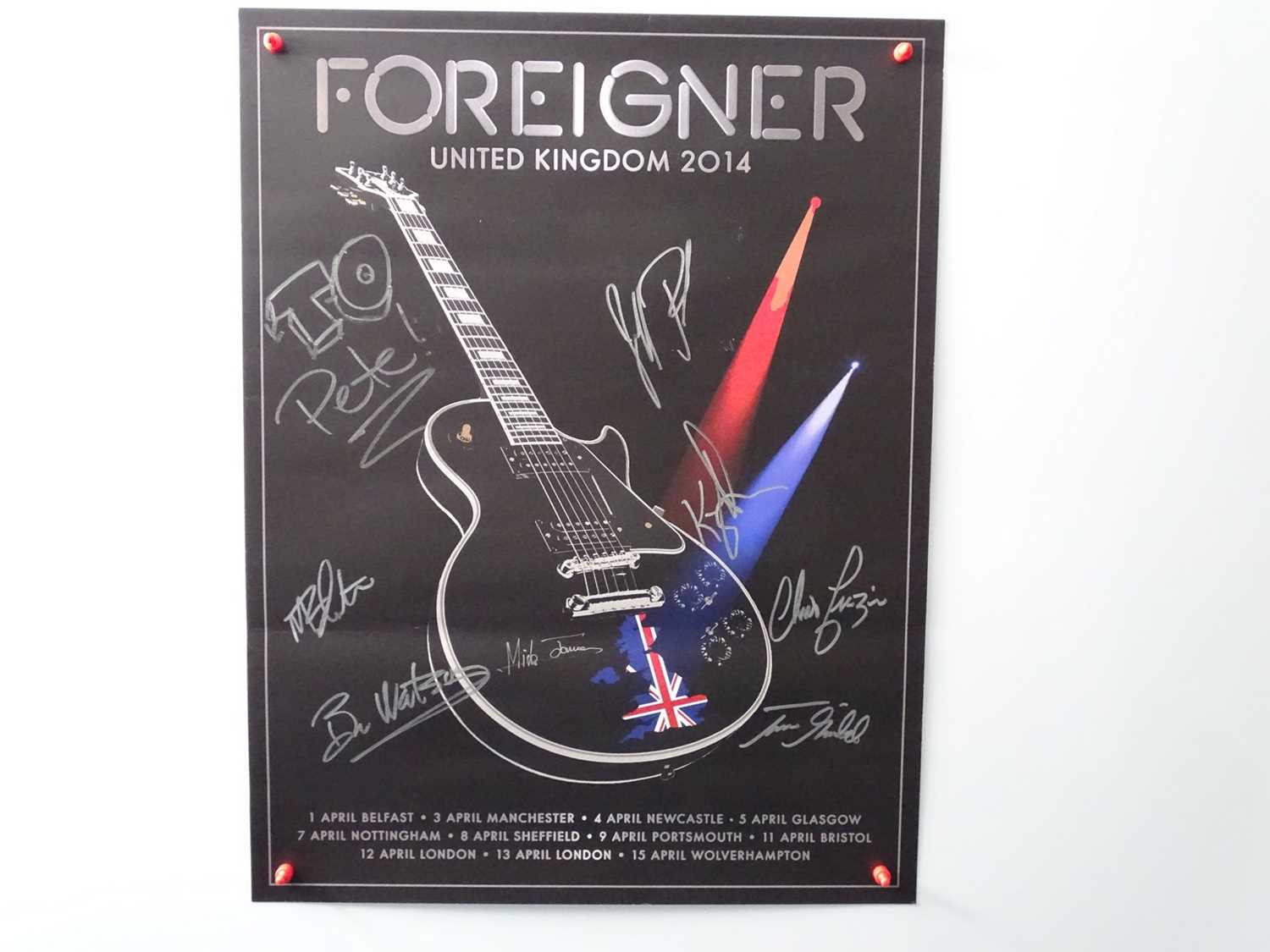 Lot 335 - FOREIGNER - fully signed concert poster from