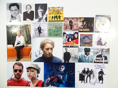 Lot 352 - VARIOUS ARTISTS - a group of signed photos and...