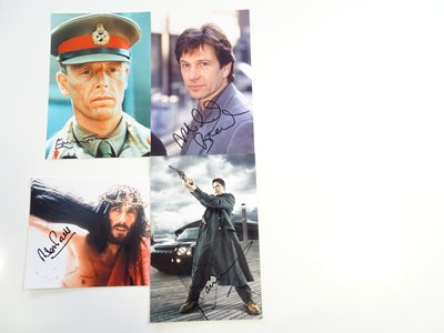 Lot 86 - A group of signed photographs of male actors...