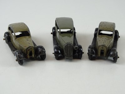 Lot 15 - A group of playworn early DINKY cars including...