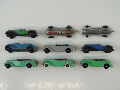 Lot 16 - A group of playworn early DINKY cars including...