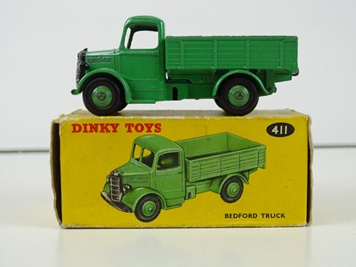 Lot 20 - A mixed group of DINKY trucks comprising a 411...