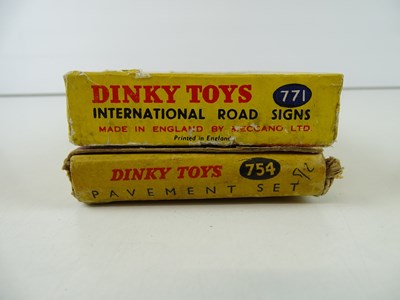 Lot 21 - A pair of DINKY accessory sets comprising a...