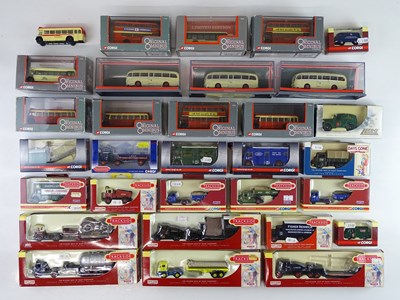 Lot 51 - A group of OO scale lorries, buses etc., from...