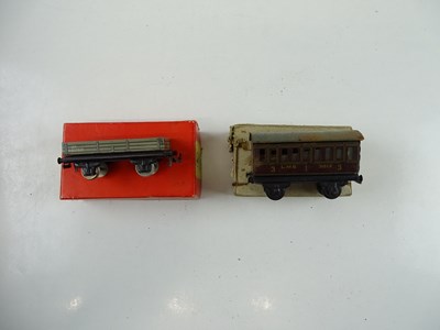 Lot 558 - A quantity of mostly unboxed TRIX TWIN wagons...