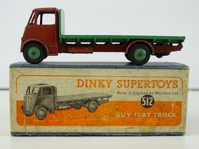 Lot 64 - A DINKY 512 Guy Flat Truck, 1st style cab, in...