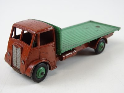 Lot 64 - A DINKY 512 Guy Flat Truck, 1st style cab, in...