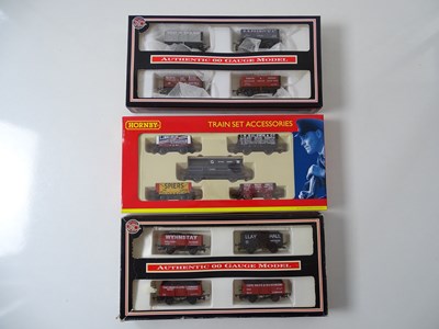 Lot 644 - A group of OO gauge wagon packs by HORNBY and...
