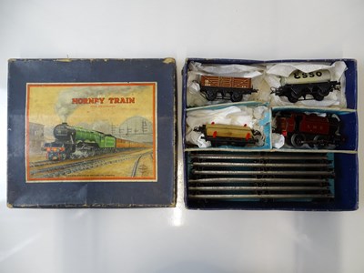 Lot 680 - A HORNBY O gauge clockwork LMS goods train set...