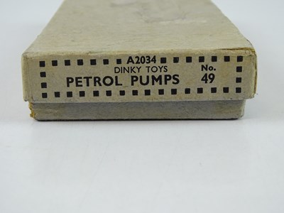 Lot 69 - A DINKY No. 49 pre-war Petrol Pumps set, repro...