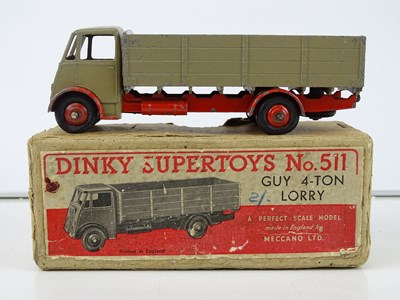 Lot 77 - A DINKY 511 Guy 4-Ton Lorry, 1st style cab, in...