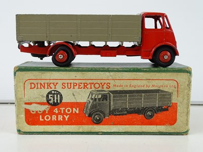 Lot 91 - A DINKY 511 Guy 4-Ton Lorry, 1st style cab, in...
