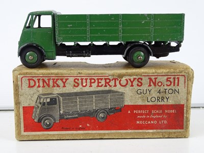 Lot 92 - A DINKY 511 Guy 4-Ton Lorry, 1st style cab, in...