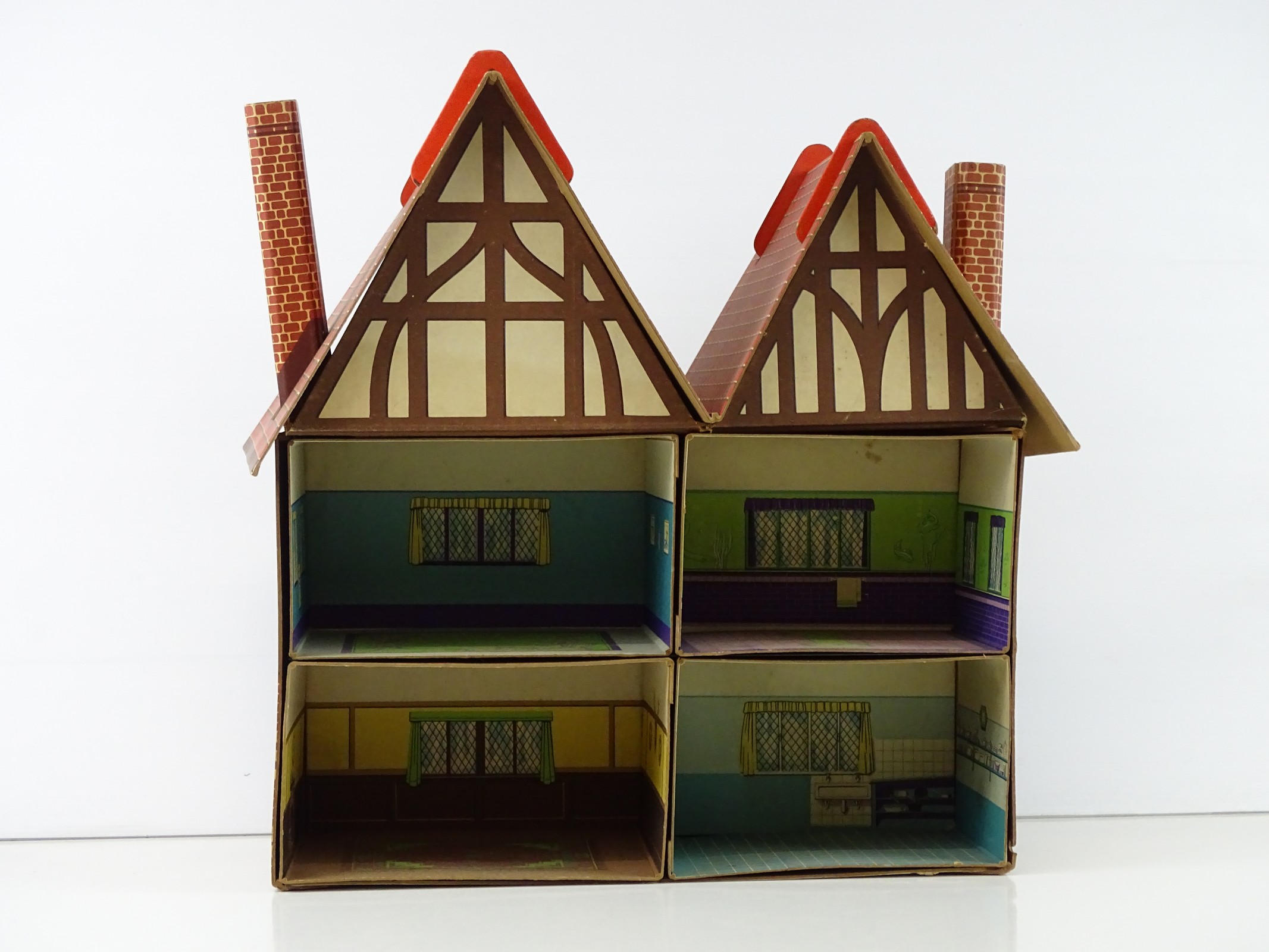 Lot 95 A DINKY prewar 'Dolly Varden' Dolls House