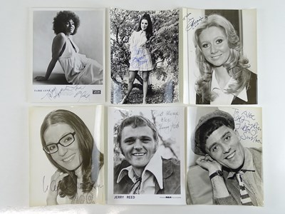 Lot 238 - SING A SONG: A group of six signed black/white...