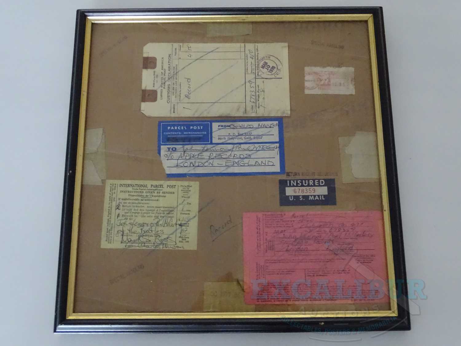 Lot 181 - Photo frame containing postal documents sent...