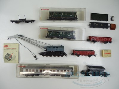 Lot 110 - A group of HO gauge wagons and coaches by...