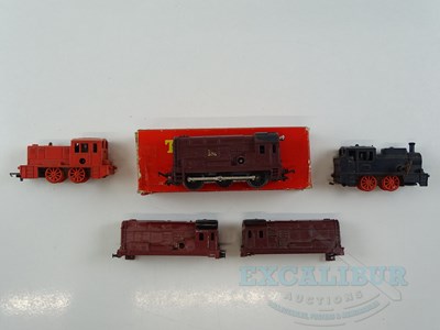 Lot 228 - A group of TRI-ANG OO gauge clockwork...