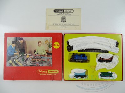 Lot 305 - A TRI-ANG OO gauge RS.24 starter goods train...