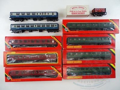 Lot 378 - A group of boxed and unboxed OO gauge wagons...