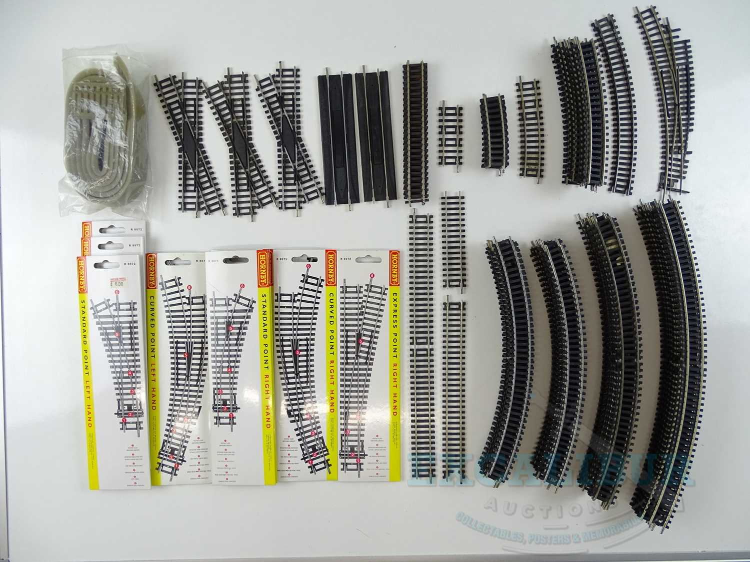 Lot 382 - A quantity of OO gauge track mostly by HORNBY -...