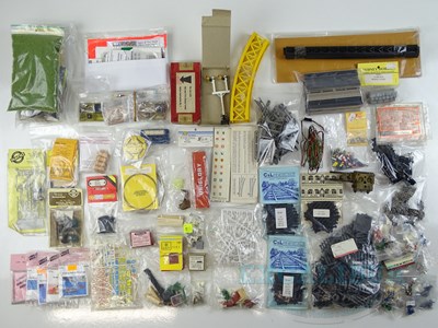 Lot 394 - A large tray of OO gauge spare parts and...