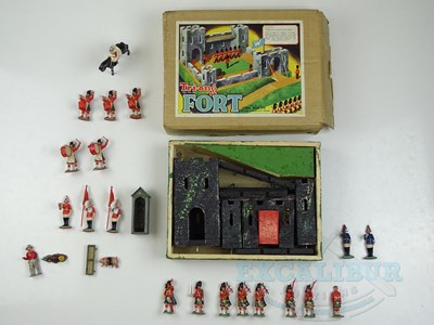 Lot 45 - A TRI-ANG wooden fort in original box together...