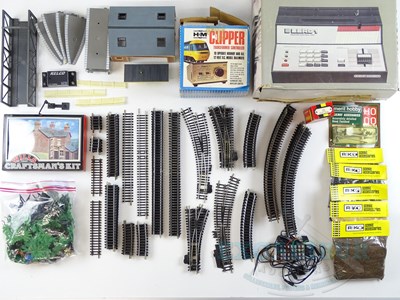 Lot 480 - A large quantity of OO gauge track, buildings,...